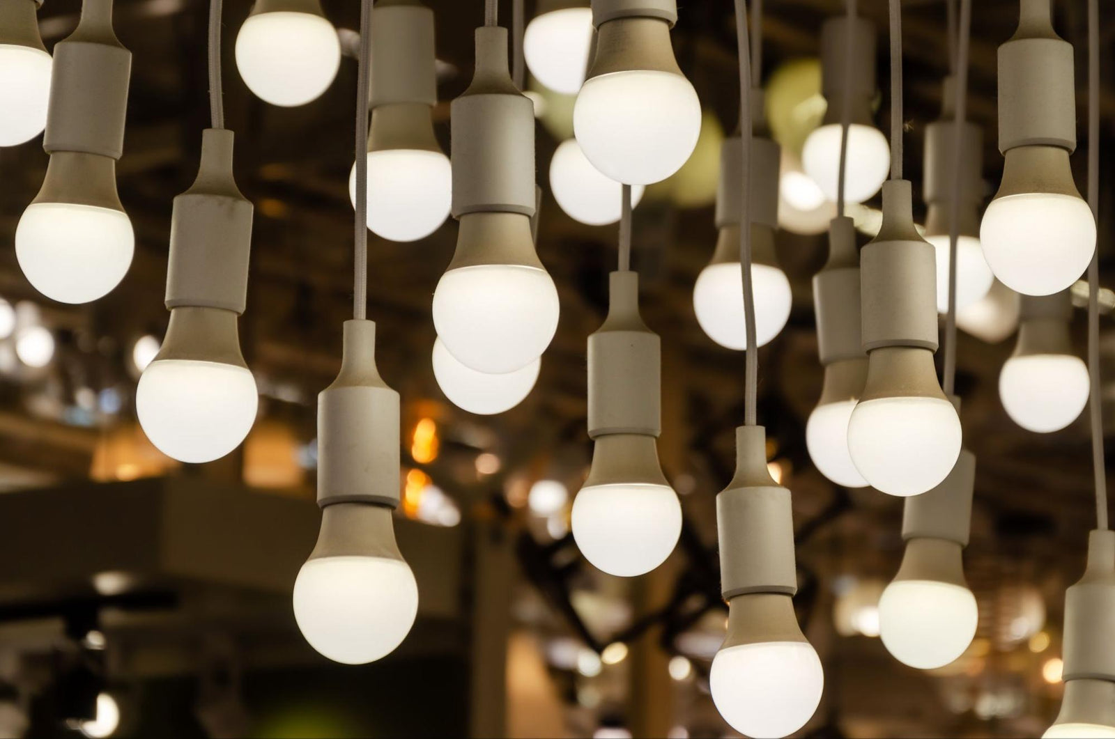 A group of LED lights handing from the ceiling.